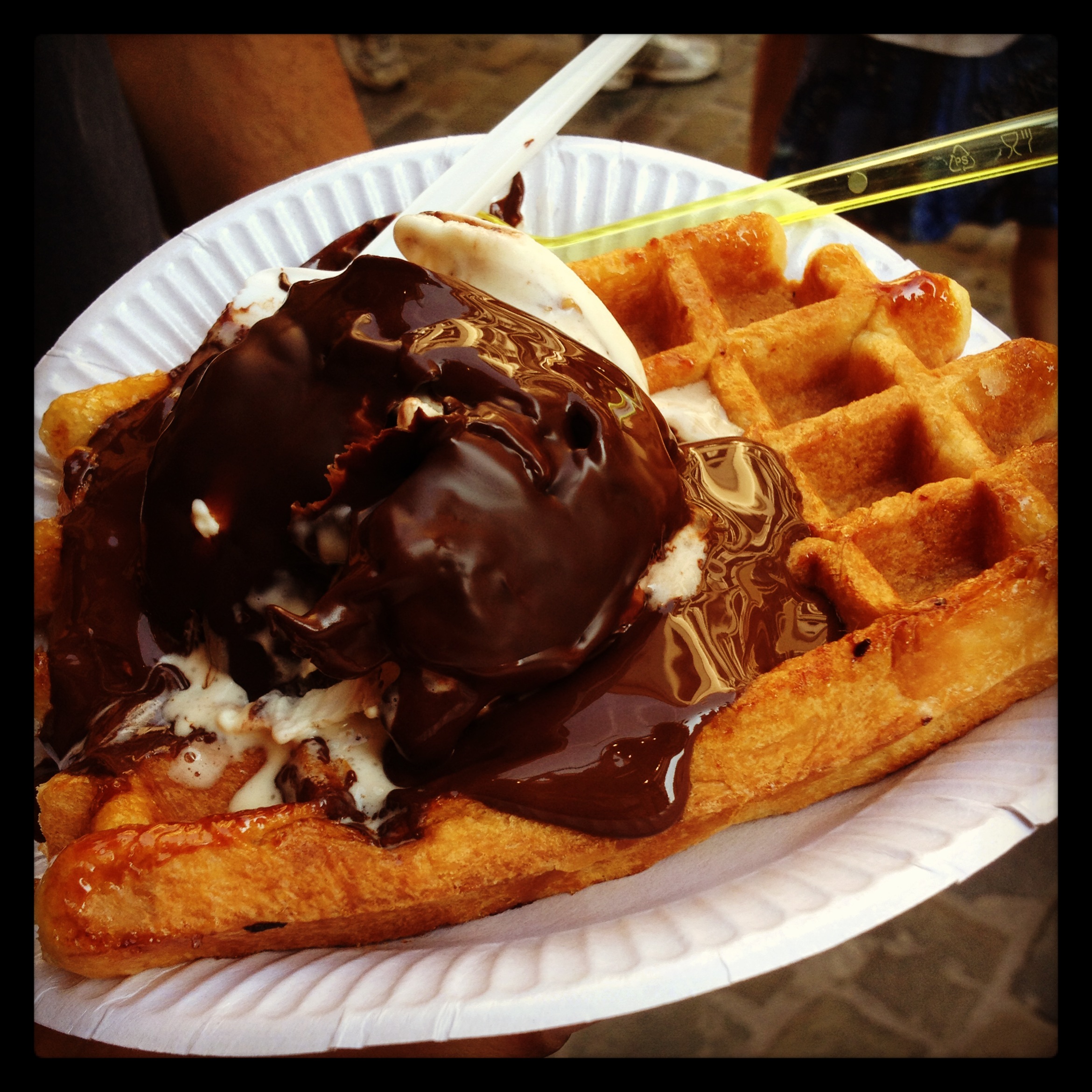 Belgian Waffle topped with ice cream and chocolate sauce